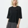 Babymonster UT Cropped Graphic T-shirt til kvinder | Gennemsigtig