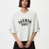 Babymonster UT kort T-shirt med grafisk print til kvinder | V-hals
