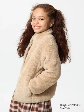 Børnejakke i fluffy fleece med gennemgående lynlås