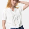 Dobbystofbluse med V-hals til kvinder