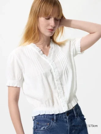 Dobbystofbluse med V-hals til kvinder