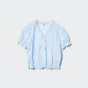 Dobbystofbluse med V-hals til kvinder