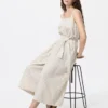 Jumpsuits til kvinder i linneblanding med indsnit | Stribet