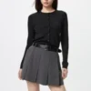 Kort ribstrikket cardigan i merinould for kvinder