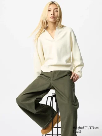 Løs polo-sweater i glat bomuld til kvinder
