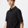 Unisex AIRism bomuldspiqué polo-skjorte med fuld åbning