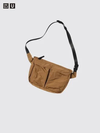Unisex sammenpakkelig crossbody-tasker med lommer