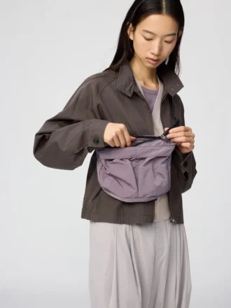 Unisex sammenpakkelig crossbody-tasker med lommer