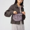 Unisex sammenpakkelig crossbody-tasker med lommer