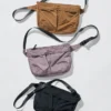 Unisex sammenpakkelig crossbody-tasker med lommer