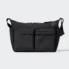 Unisex skuldertask med flere lommer