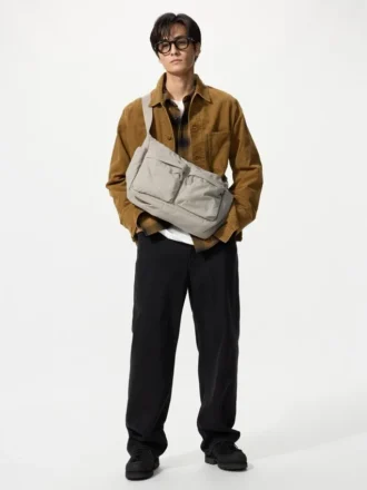 Unisex skuldertask med flere lommer